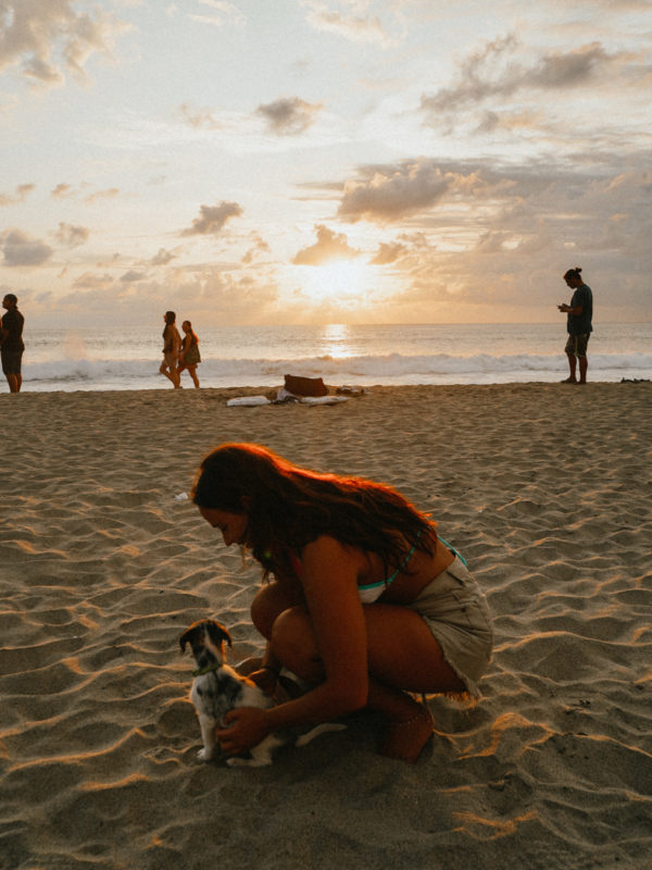 La Punta sunset with dog and girl