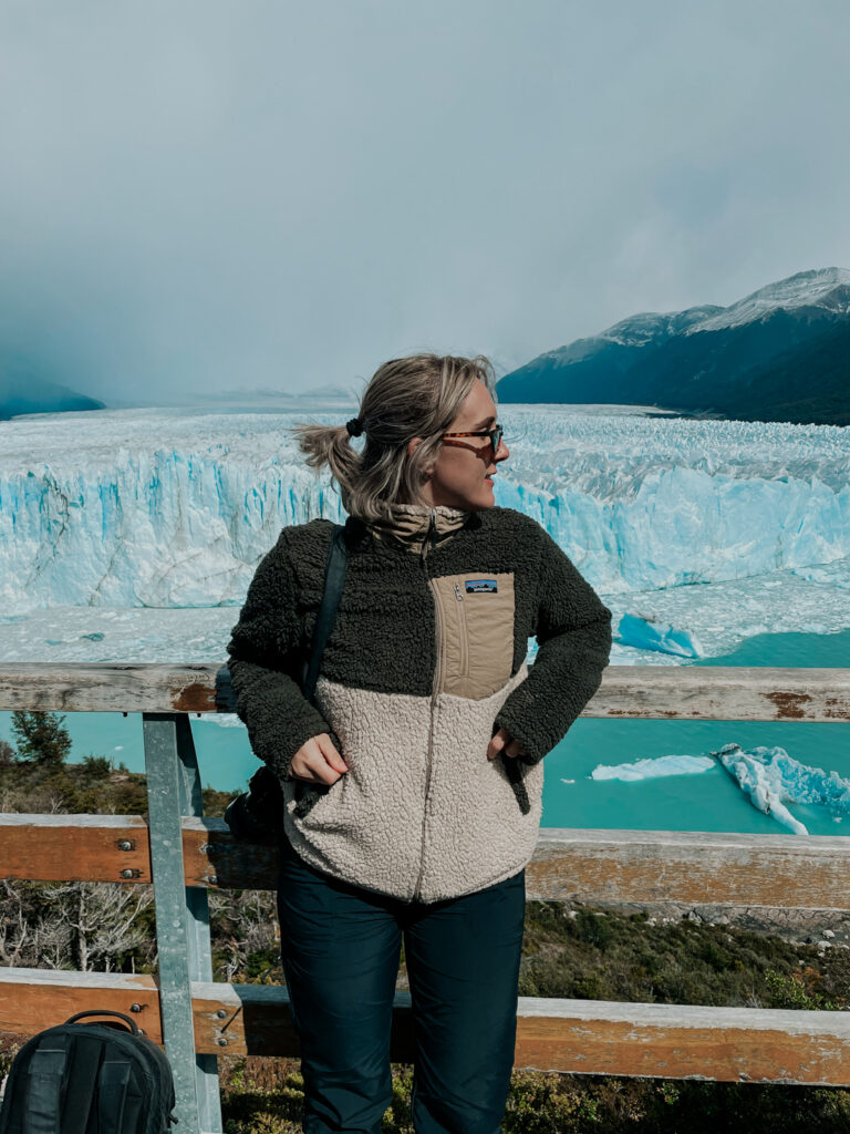 posing in front of Perito Moreno glacier in Argentina, southern Patagonia