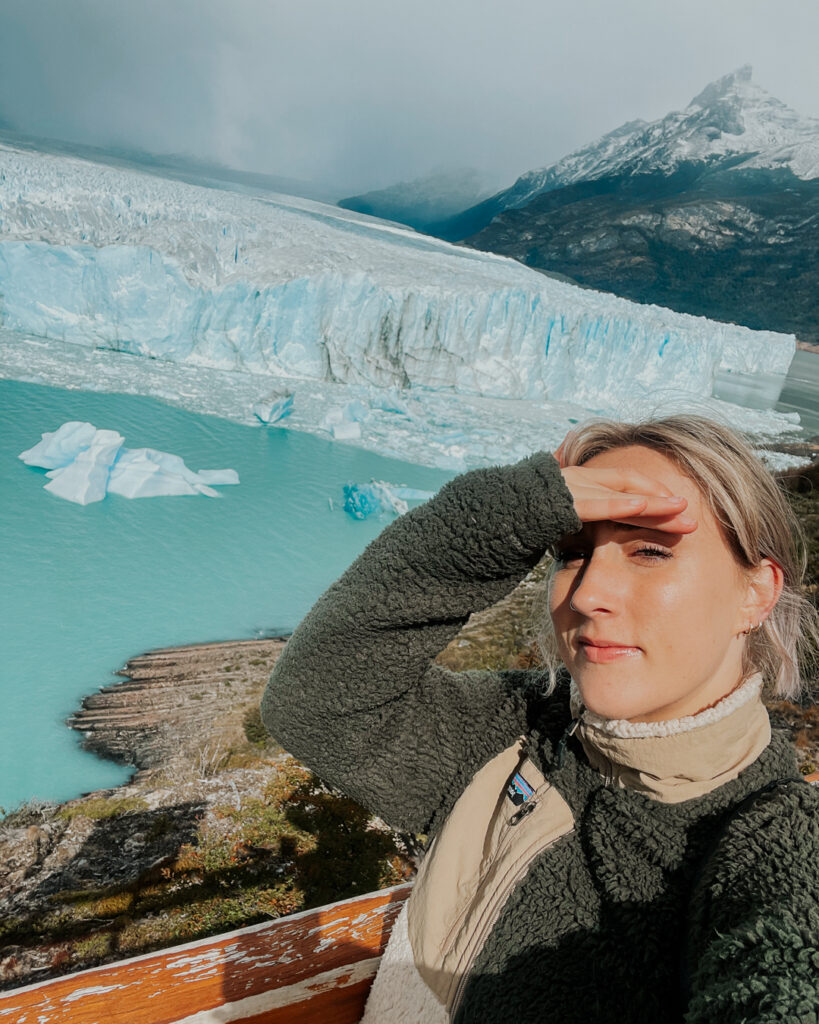 selfie of solo female traveler at Perito Moreno glacier in Argentina, southern Patagonia