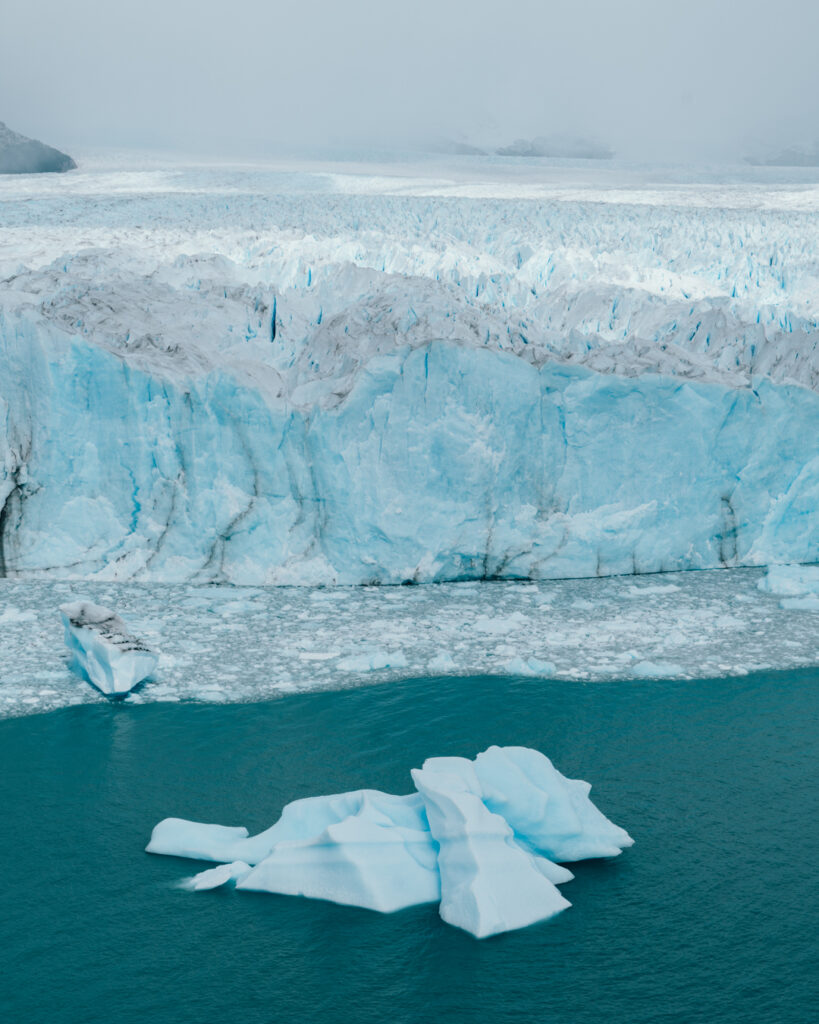 a blue ice wall and iceberg of Perito Moreno glacier in Argentina, southern Patagonia