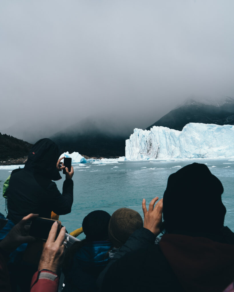 People take photos of Perito Moreno glacier