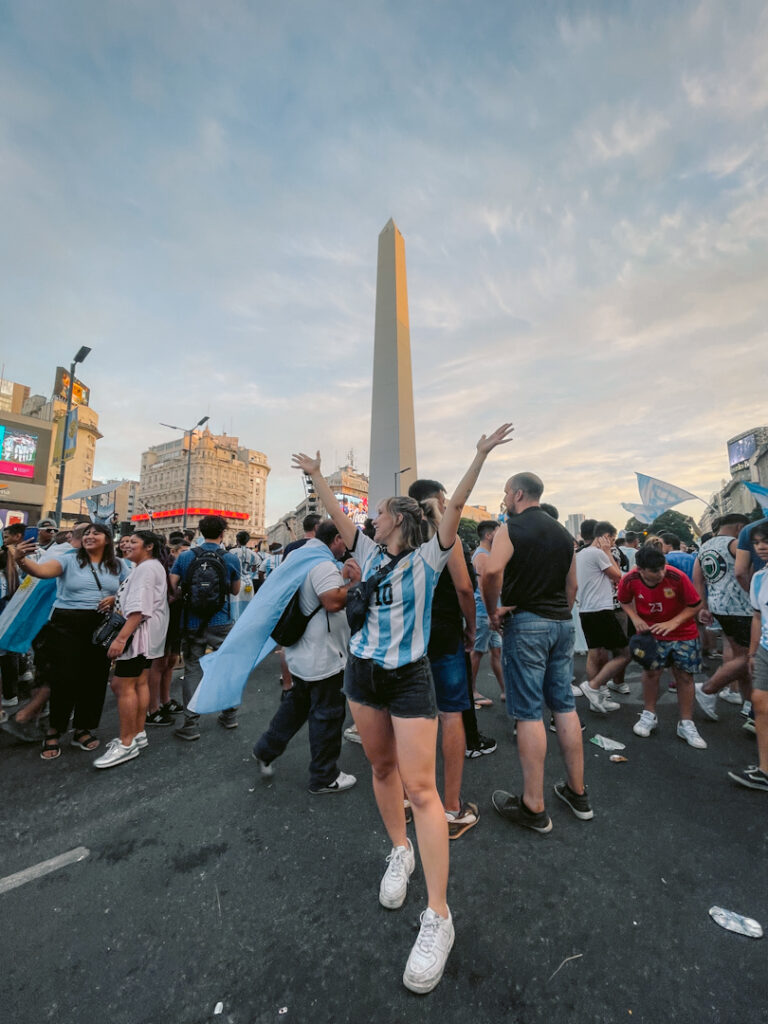 traveler celebrating the world cup in Buenos Aires Argentina 2022 in front of el obelisco