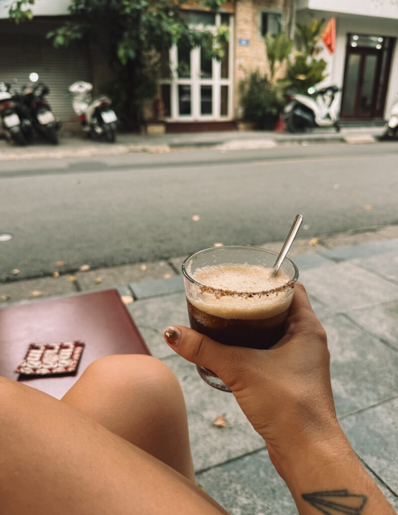 Drinking iced coffee Hanoi Vietnam on street
